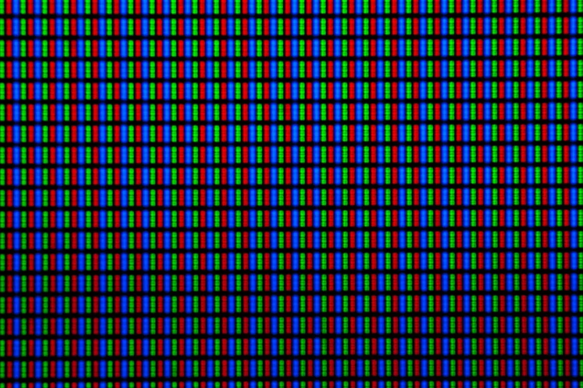 Macro of a screen's red, green, and blue subpixels